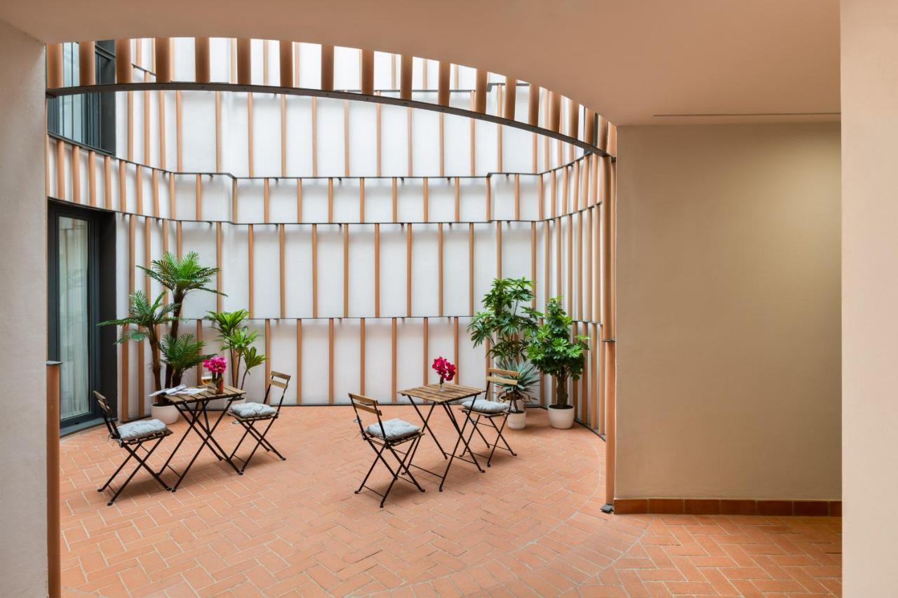 Avanti Clavel, La Terraza Te Conquistara Sevilla Buitenkant foto